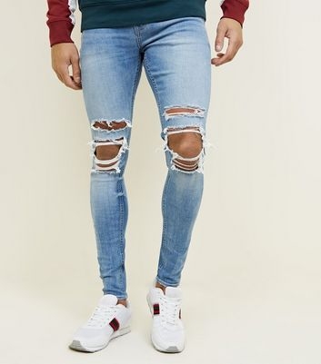 Pale Blue Ripped Knee Spray On Jeans