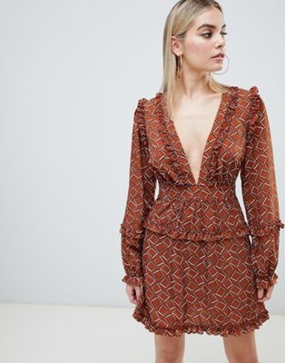 PrettyLittleThing plunge skater dress in brown geo print