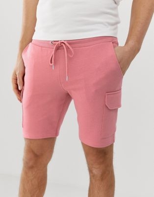 ASOS DESIGN jersey skinny shorts with cargo pockets in pink