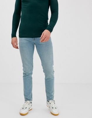 ASOS DESIGN skinny jeans in vintage greencast