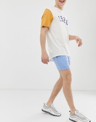 ASOS DESIGN jersey skinny shorts in blue