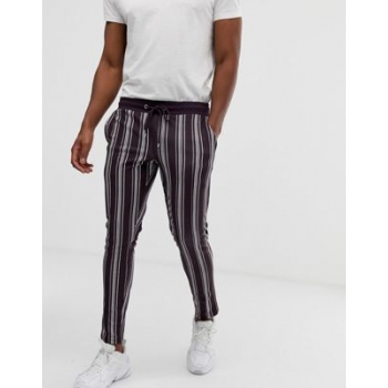 ASOS DESIGN skinny joggers in poly tricot fabric with all over stripes