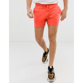 ASOS DESIGN jersey skinny shorts in shorter length in bright coral