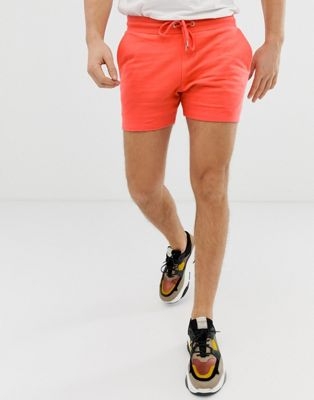 ASOS DESIGN jersey skinny shorts in shorter length in bright coral