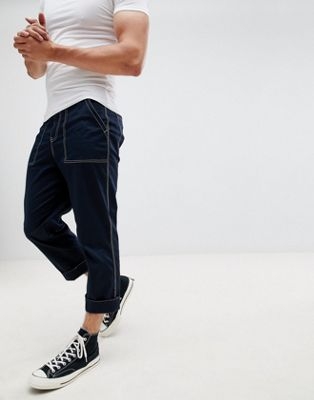 ASOS DESIGN relaxed cropped trousers in navy with white stitching