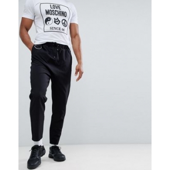 ASOS DESIGN drop crotch trousers in black with metal details