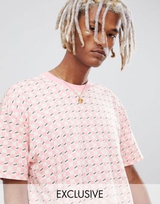 Vans checkerboard t-shirt in pink Exclusive at ASOS