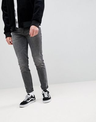 ASOS DESIGN skinny jeans in vintage washed black