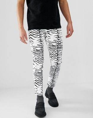 ASOS DESIGN skinny jeans in leather look zebra print