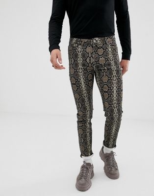 ASOS DESIGN skinny jeans in snake print