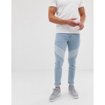 ASOS DESIGN skinny jeans in light wash blue cut and sew panelling