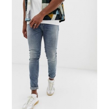 United Colors Of Benetton mid wash skinny jeans in rip and repair