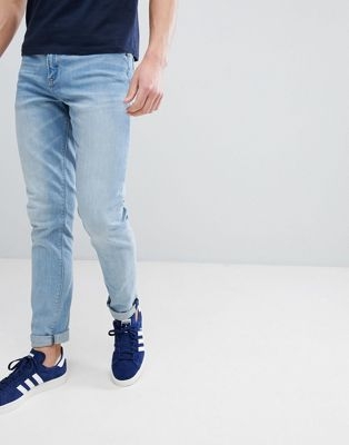 ASOS DESIGN skinny jeans in light wash blue