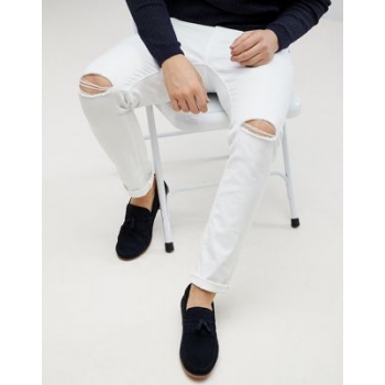 ASOS DESIGN skinny jeans in white with knee rips