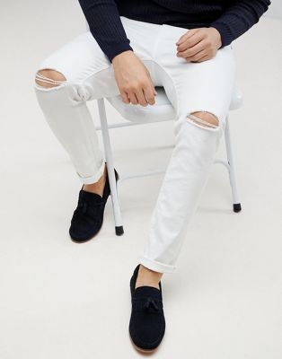 ASOS DESIGN skinny jeans in white with knee rips