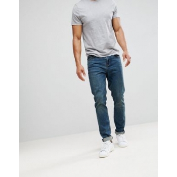 ASOS DESIGN skinny jeans in vintage dark wash