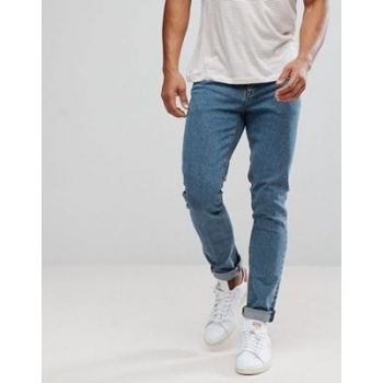 ASOS DESIGN skinny jeans in flat mid blue