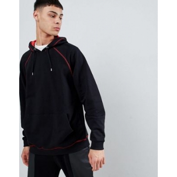 ASOS DESIGN oversized hoodie in red with contrast stitching