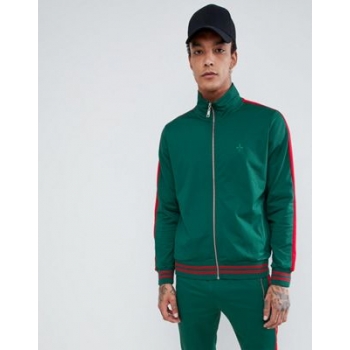 Criminal Damage track jacket in green with red side stripe