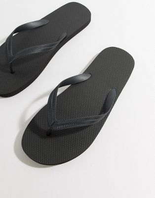 ASOS DESIGN flip flops in black