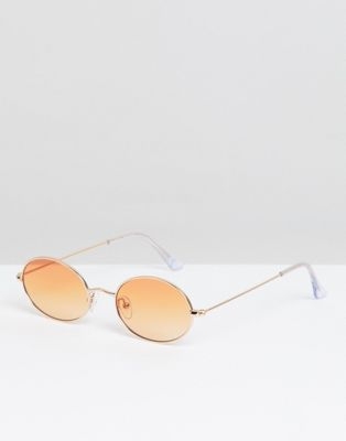 ASOS DESIGN oval glasses in gold with orange lens