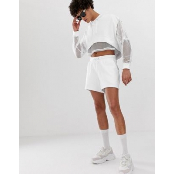 ASOS DESIGN co-ord jersey shorts with mesh overlay in white