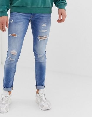 Jack & Jones skinny fit rip & repair jeans in light blue