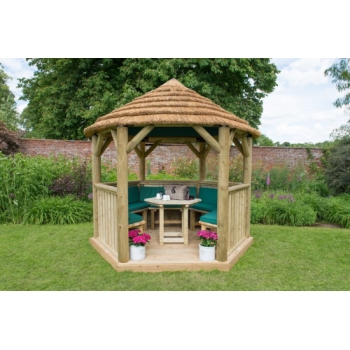 Forest Garden 3m Hexagonal Wooden Garden Gazebo with Thatched Roof - Furnished with Table, Benches and Cushions (Green)